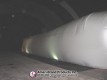 Full side view of a long white inflatable pitching dome