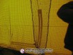 Close view of the overlapping net entry inside the pitching dome
