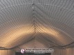 Close view of ceiling netting above the pitching dome impact screen