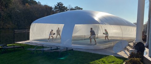 Pickleball and sports court inside an air-supported dome
