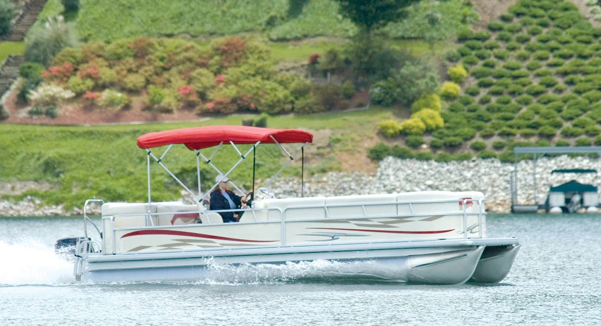 Red 1 inch square tube frame pontoon bimini top on a Sweetwater pontoon boat