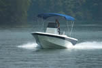 3 Bow Pacific Blue Sunbrella Bimini Top On Center Console Boat - While Running