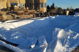 Contstruction Dome - Laying out dome over workspace.