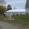 White Air Dome - Side profile, partially eclipsed by the house