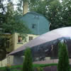 View from below looking up at pool dome and house