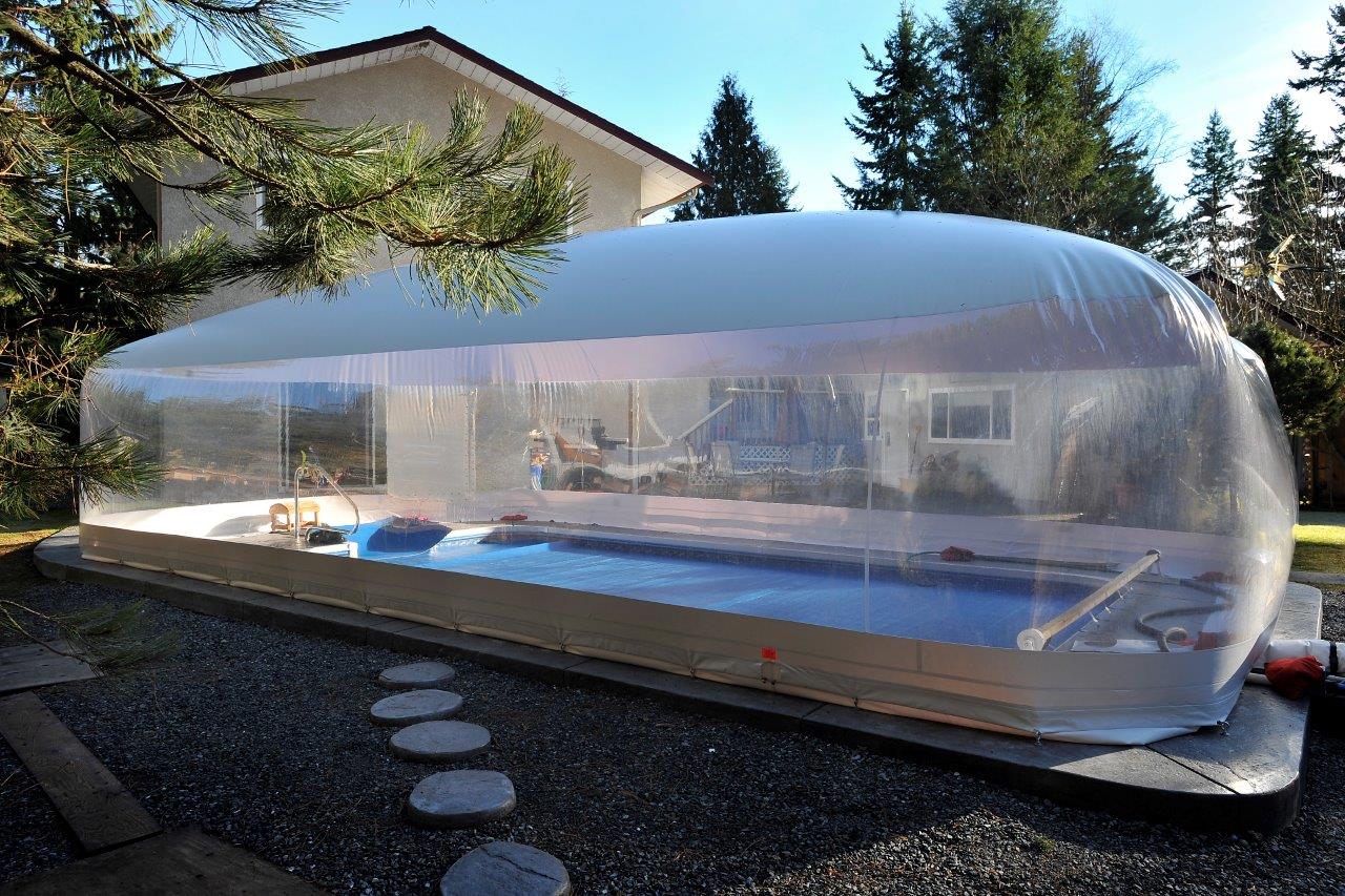 Custom Ameri-Dome fitted around a residential pool and deck