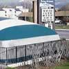 Commercial pool dome with rotary door