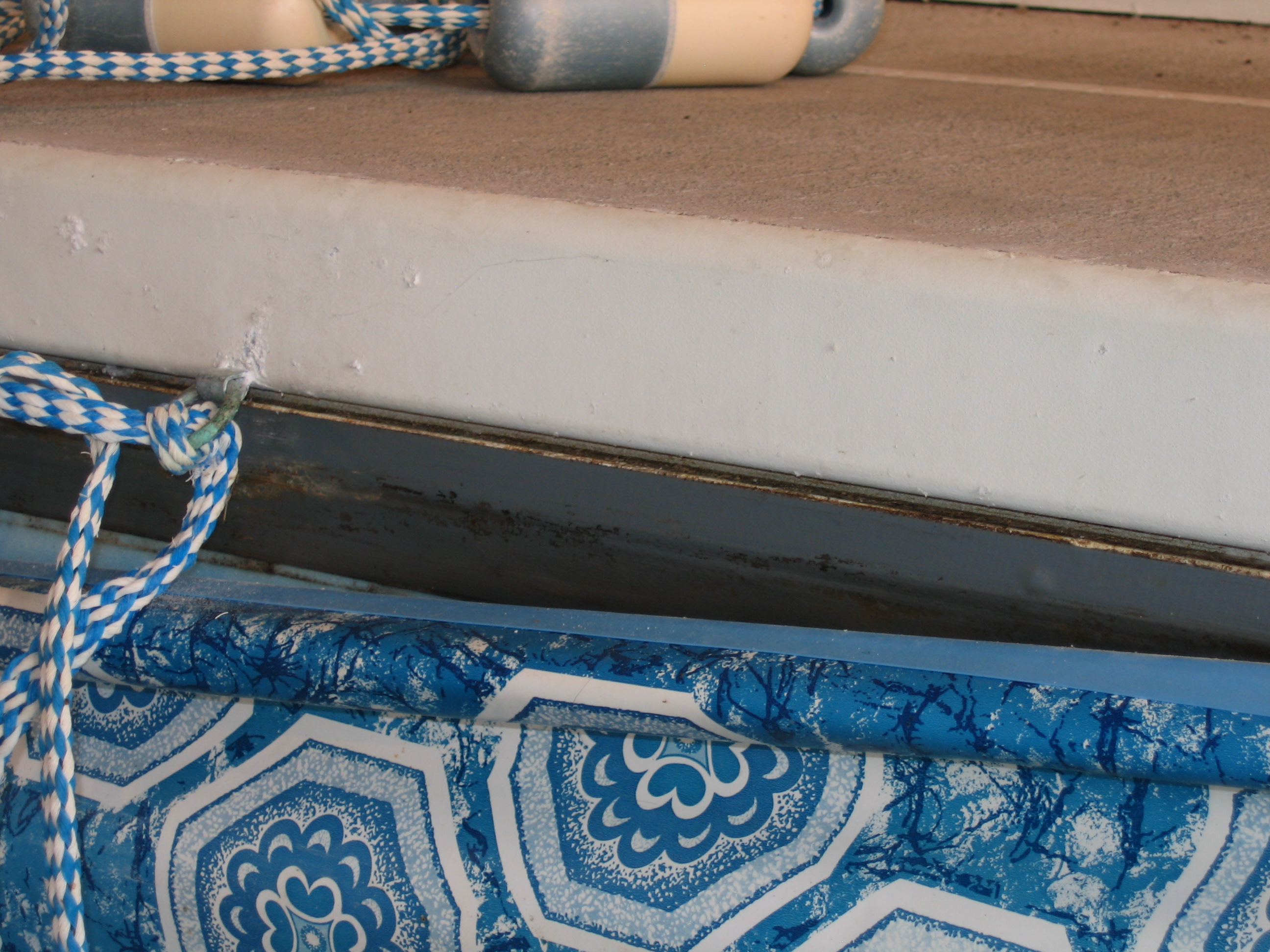 Beaded inground pool liner edge near the liner track