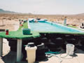 Desert lap pool, created from tires, cement, and a custom ameri-liner