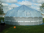 Side view of a new Sundome on a soft-sided pool