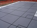 Grey solid vinyl pool cover.