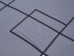 A close up detail of the high quality webbing used on our pool covers.
