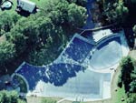 Aerial View Of Three Navy Blue Swimming Pool Covers