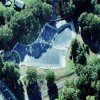 Aerial view of 3 large custom pool covers