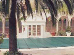 2nd photo of white house pool cover