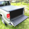 Tonneau cover with truck bed down